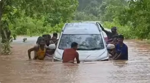 Teacher Escapes Floodwaters While Driver is Rescued After Car is Swept Away in Odisha